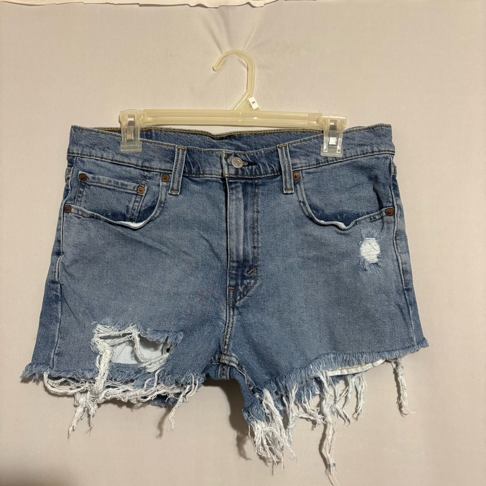 Levi's 412 Light Wash Raw Hem Fray Denim Jean Shorts size 33